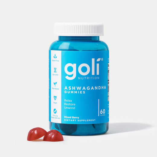 El frasco de Goli Ashwagandha con dos gomitas rojas