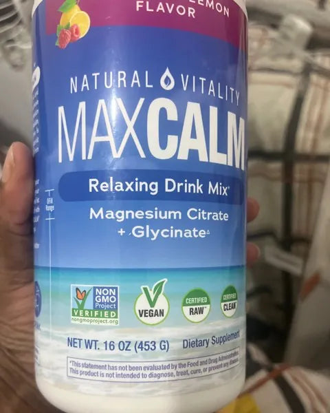 Foto de Paula: el tarro de MaxCalm en la mano